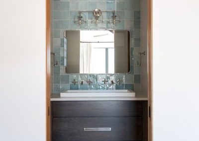 Powder Room with dark brown cabinets.